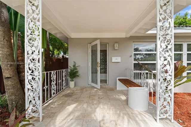 a view of a porch with furniture