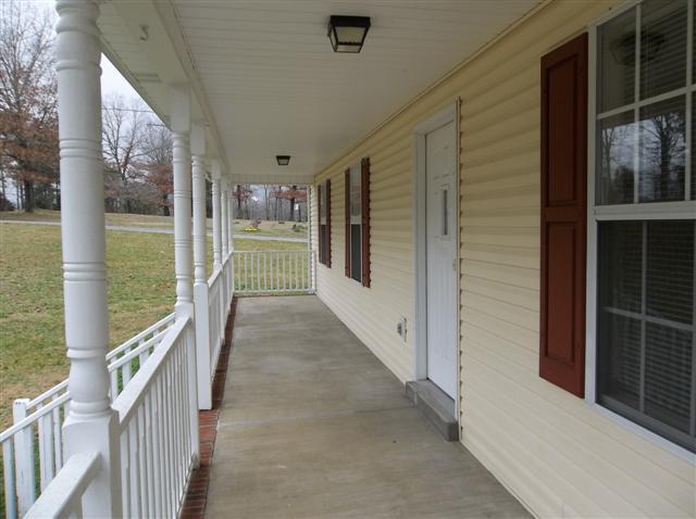 1470 Rock Church Road Dickson, TN 37055 - Photo 4 of 10 Full covered front porch ready for the rocking chairs..