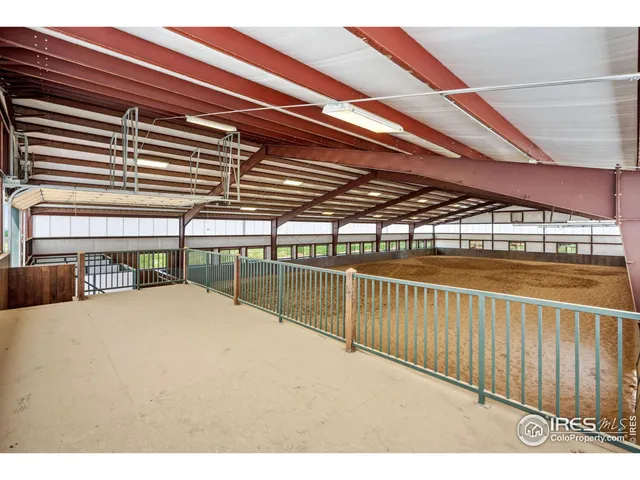 a view of balcony with furniture