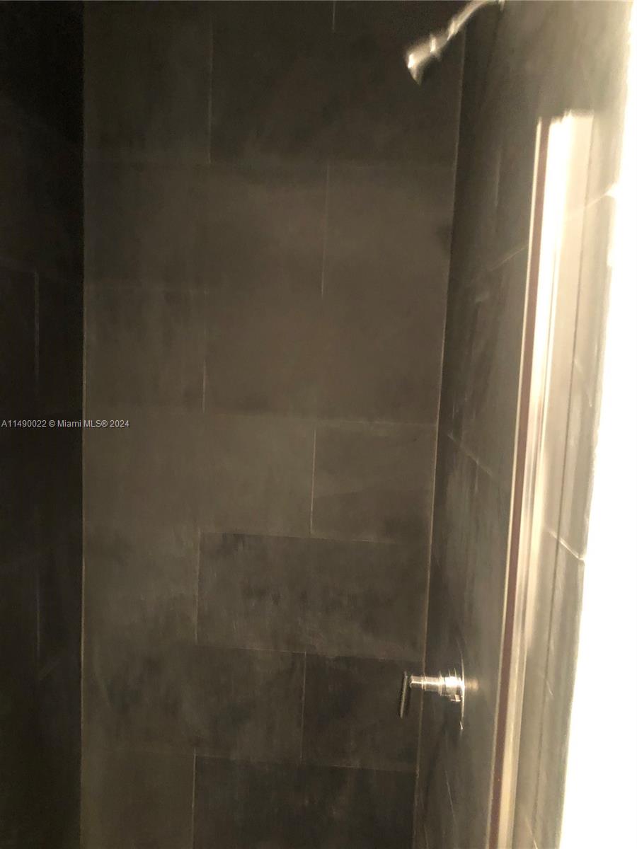 900 Biscayne Boulevard, Unit 4904 Miami, FL 33132 - Photo 16 of 29 a close view of a bathroom shower
