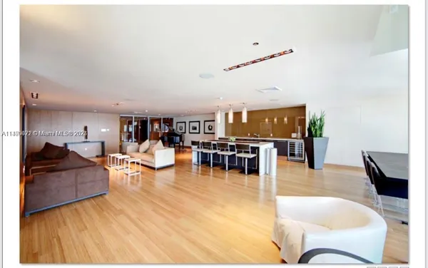 a view of a livingroom with furniture and rug