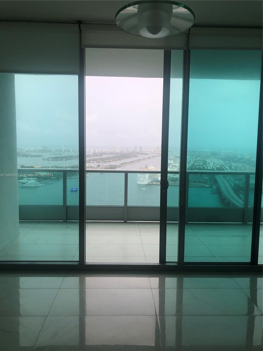900 Biscayne Boulevard, Unit 4904 Miami, FL 33132 - Photo 5 of 29 a view of a glass door