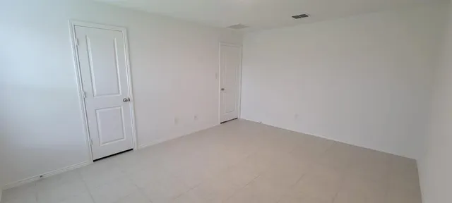 a bathroom with a sink a toilet and vanity