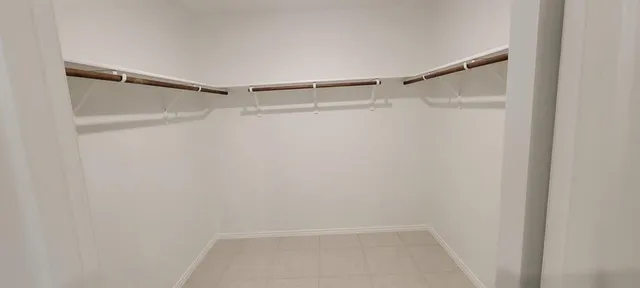 a view of a room that has a window in it