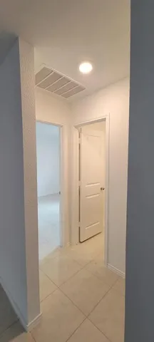 a view of house with garage