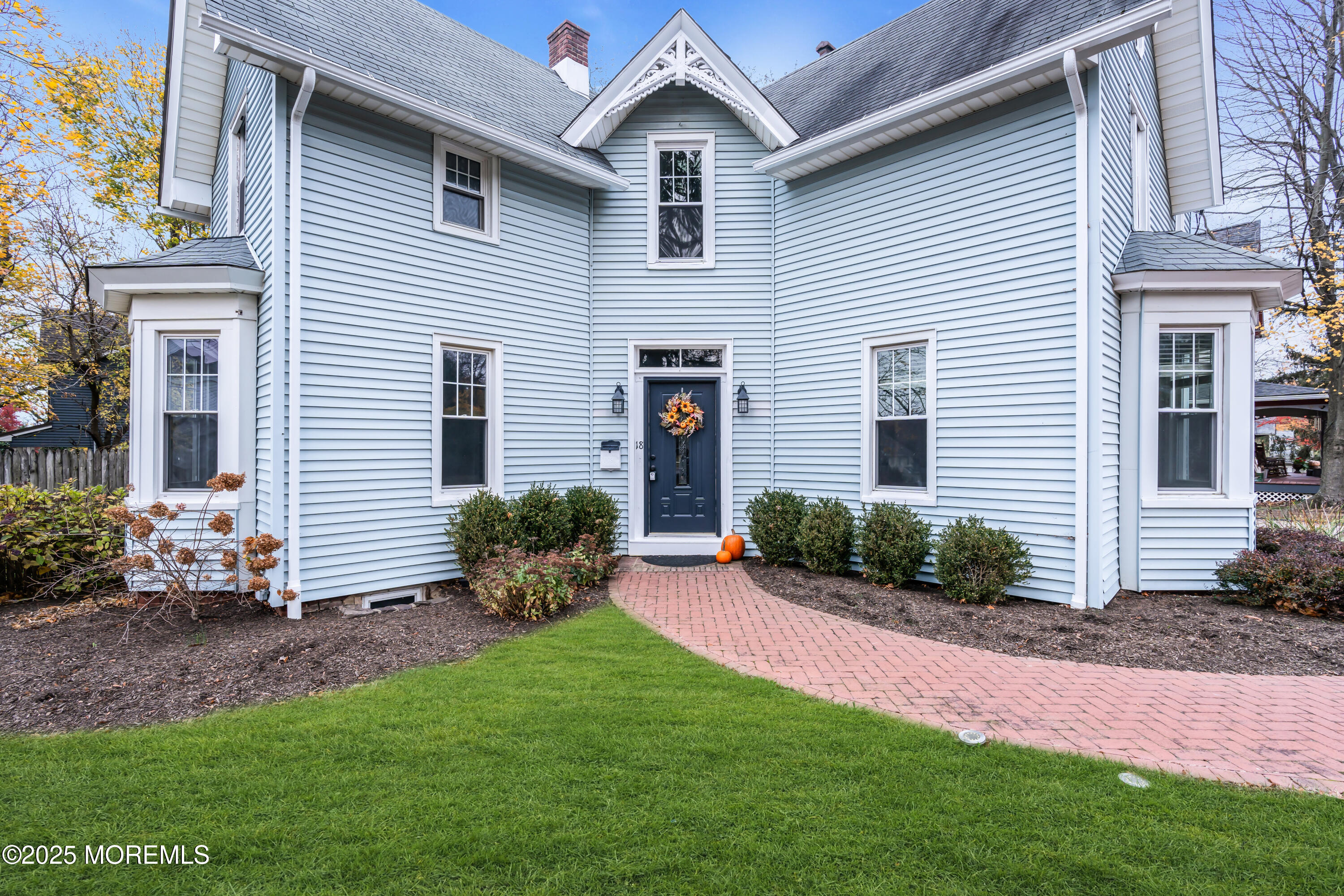 18 Middletown Avenue Atlantic Highlands, NJ 07716 - Photo 1 of 35 a front view of a house with garden