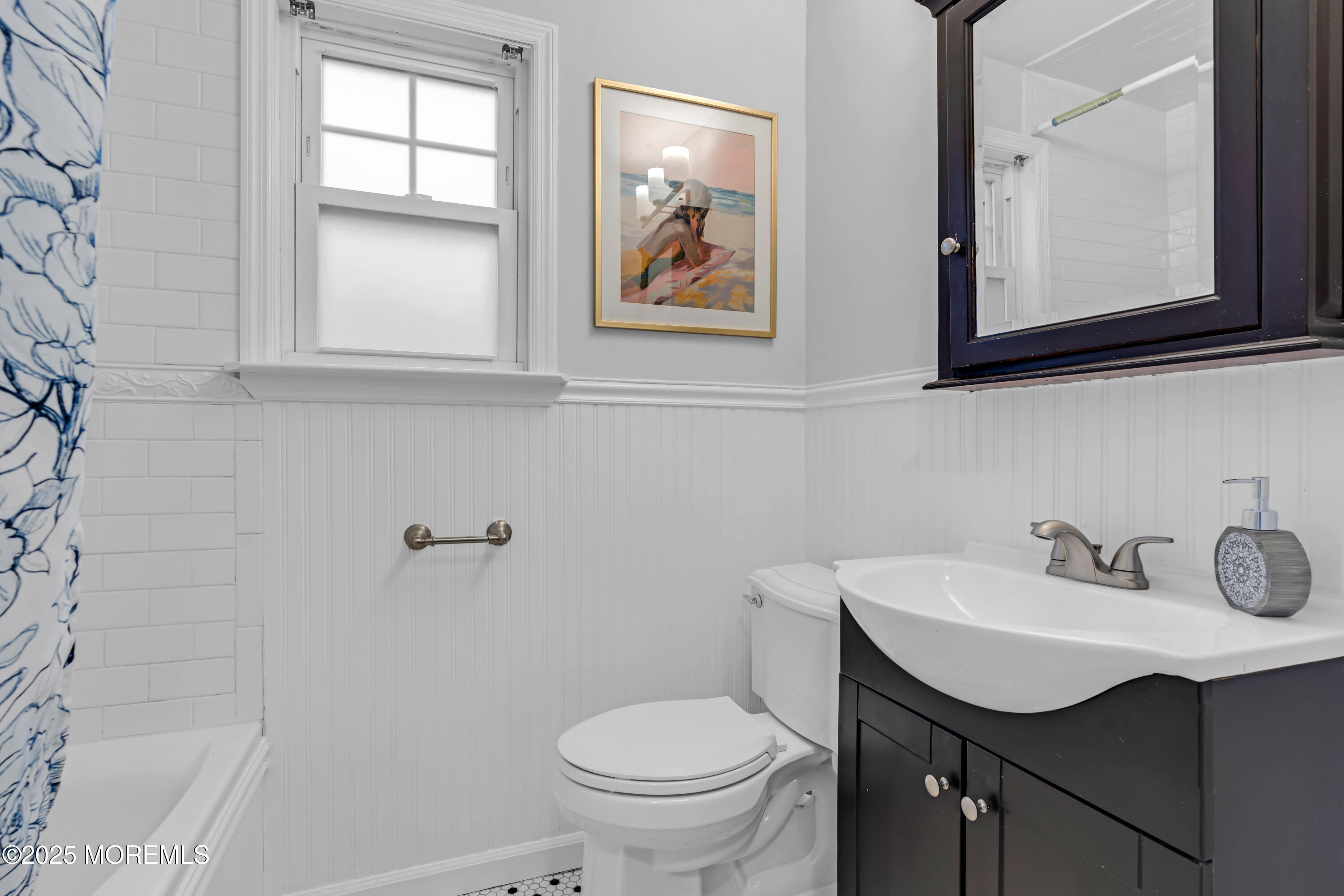 18 Middletown Avenue Atlantic Highlands, NJ 07716 - Photo 12 of 35 a bathroom with a toilet sink and mirror