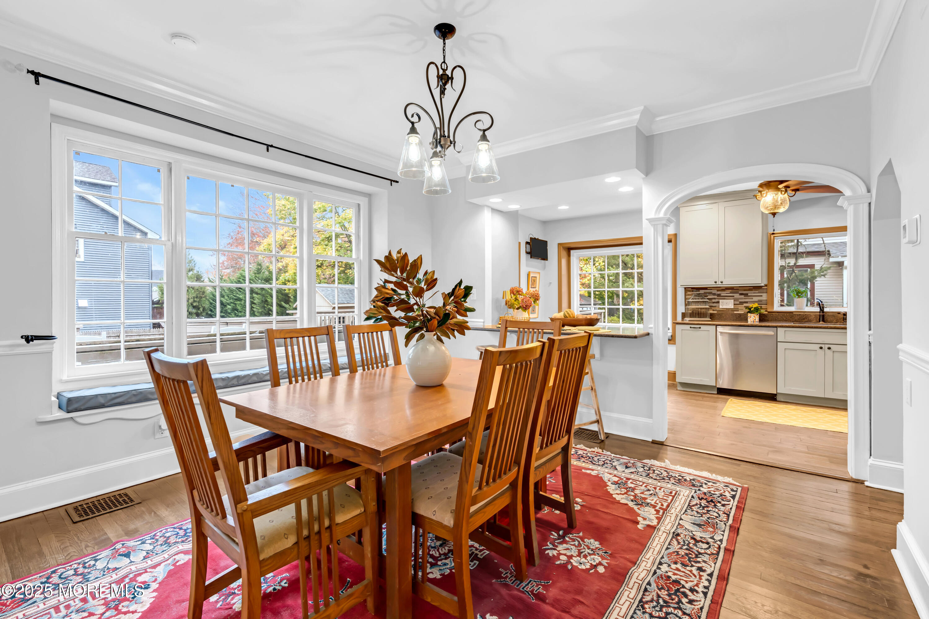 18 Middletown Avenue Atlantic Highlands, NJ 07716 - Photo 14 of 35 a dining room with furniture a chandelier and wooden floor