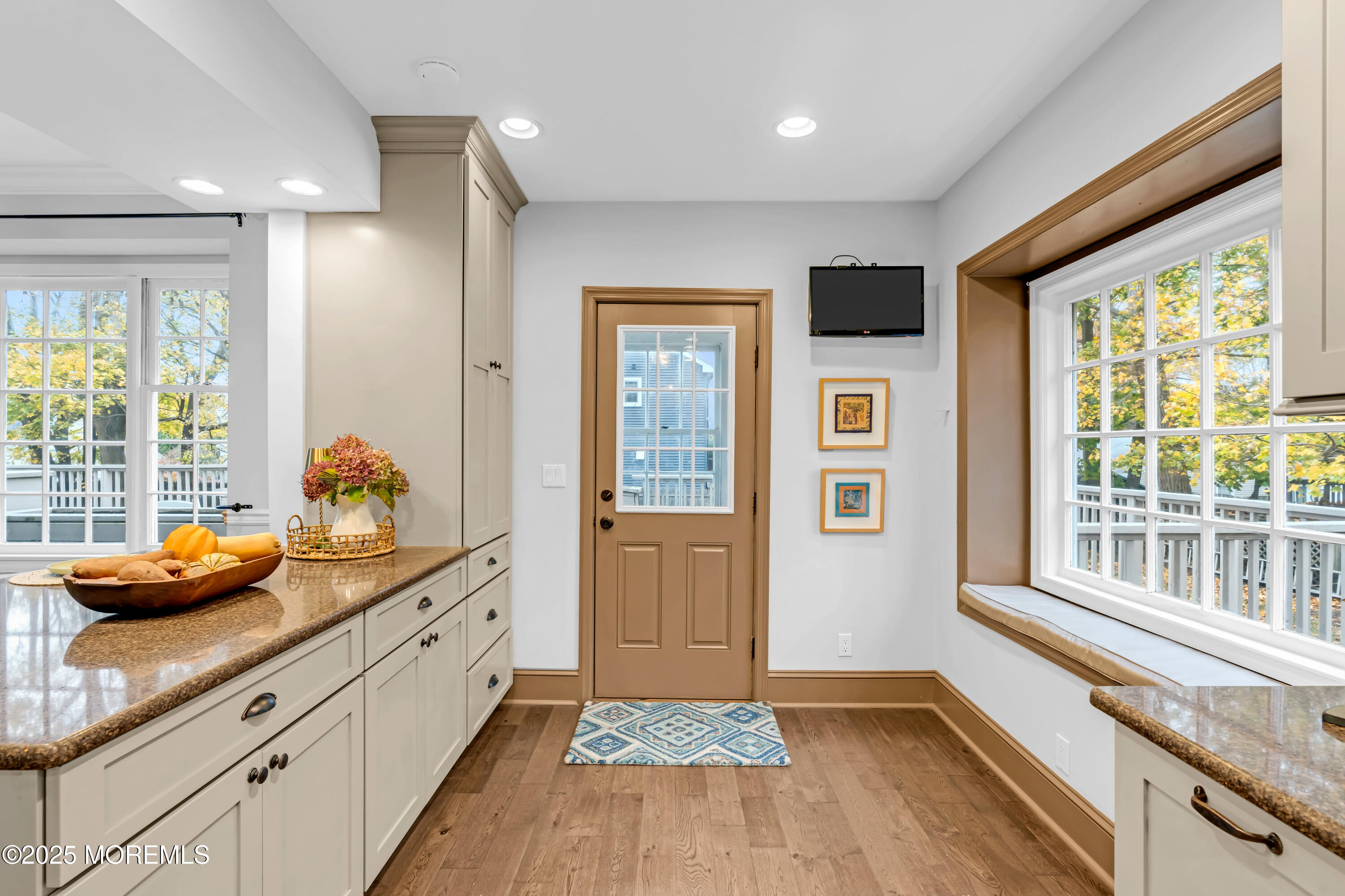 18 Middletown Avenue Atlantic Highlands, NJ 07716 - Photo 17 of 35 a hallway with a large window and couch