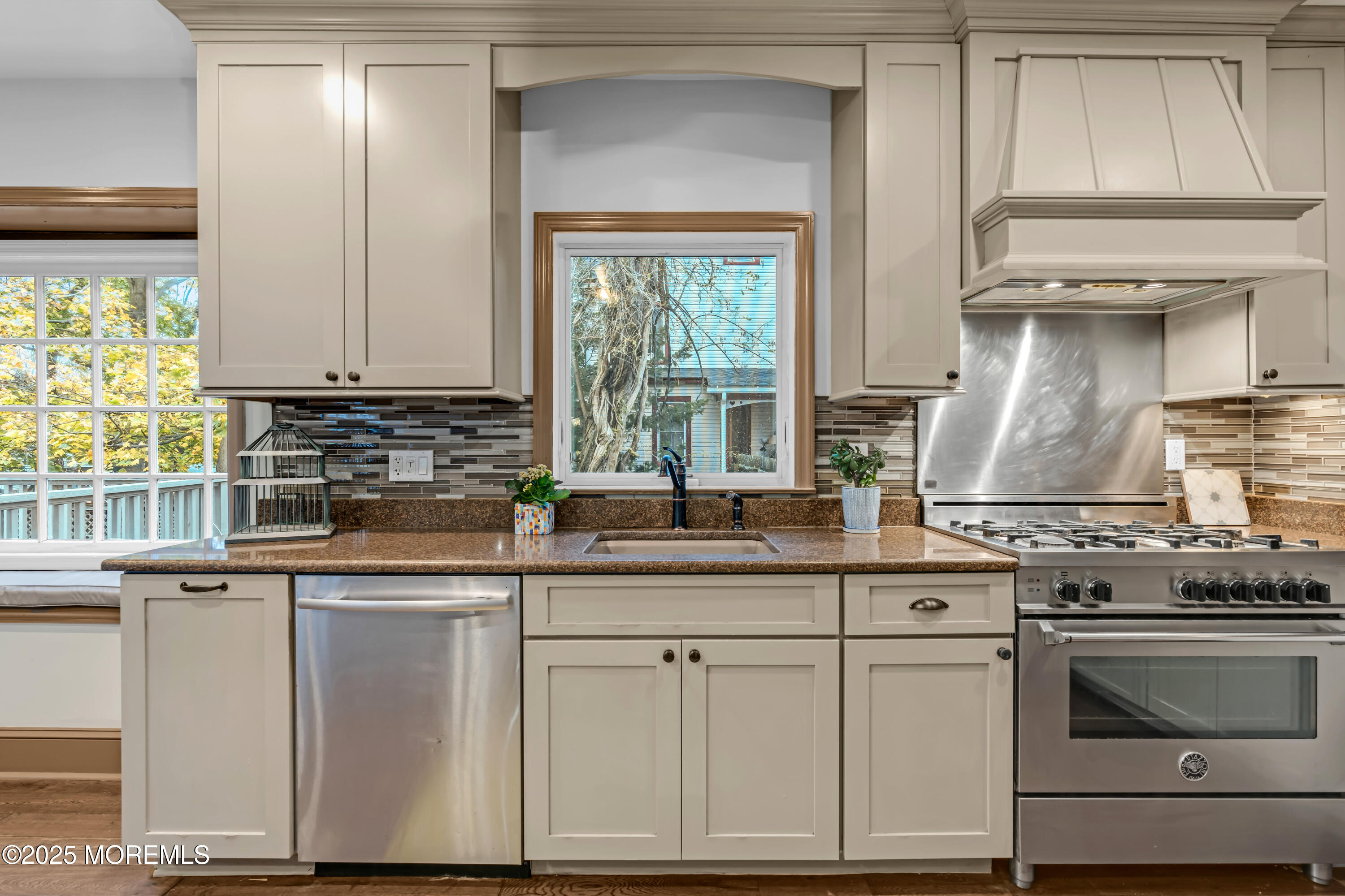 18 Middletown Avenue Atlantic Highlands, NJ 07716 - Photo 19 of 35 a kitchen with granite countertop a sink stainless steel appliances and cabinets