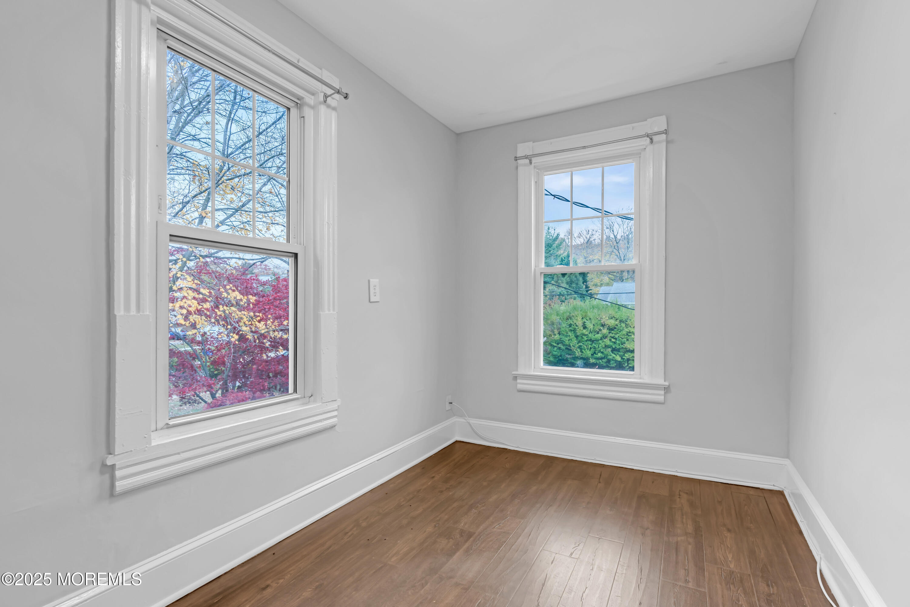 18 Middletown Avenue Atlantic Highlands, NJ 07716 - Photo 27 of 35 an empty room with wooden floor and windows