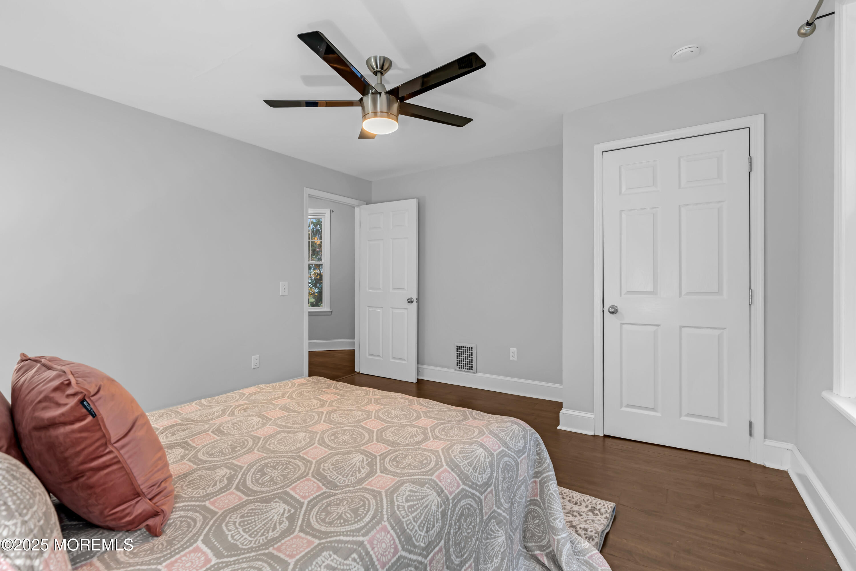 18 Middletown Avenue Atlantic Highlands, NJ 07716 - Photo 28 of 35 a bedroom with a large bed and a chandelier