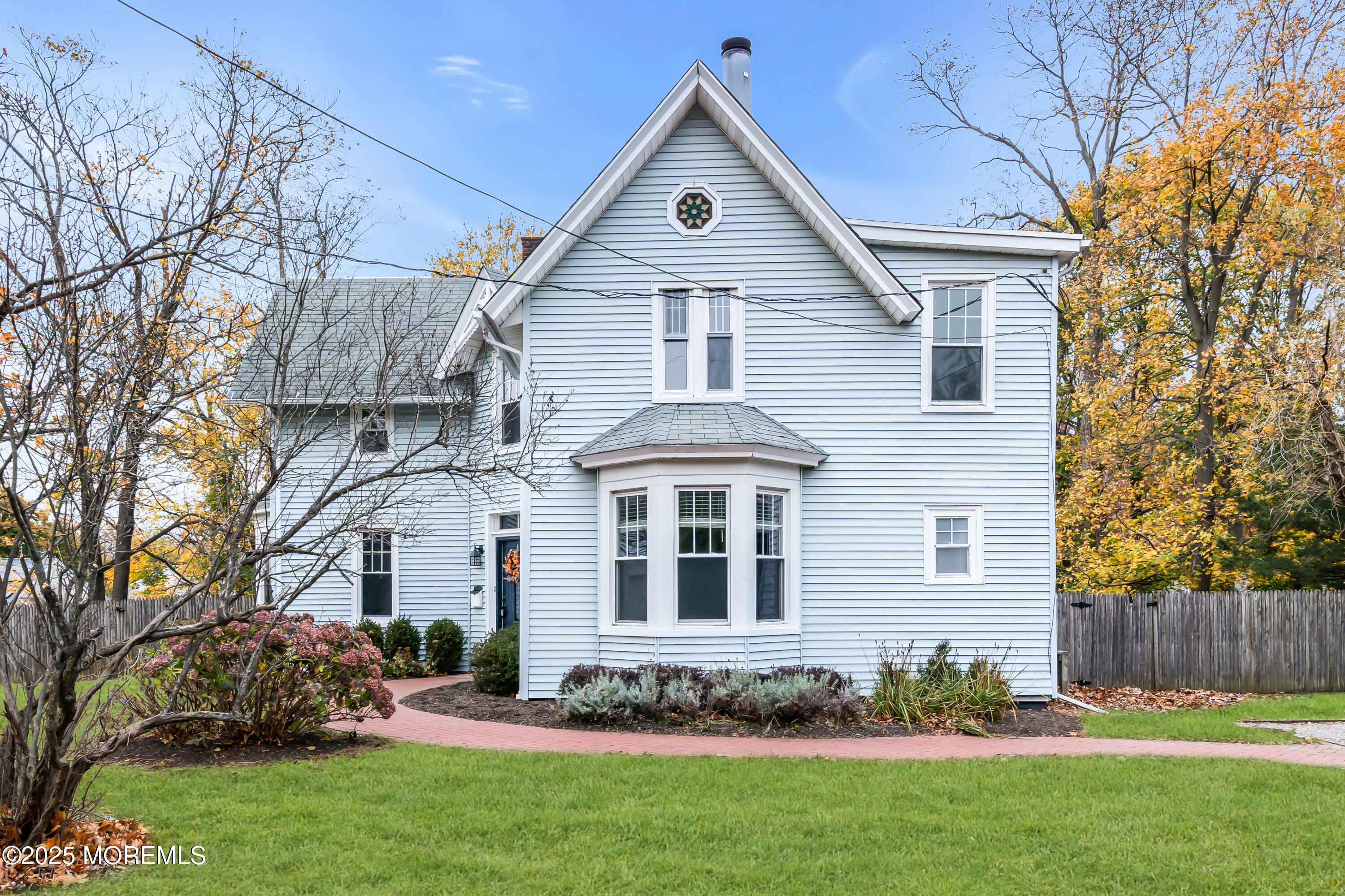 18 Middletown Avenue Atlantic Highlands, NJ 07716 - Photo 3 of 35 a front view of a house with a garden