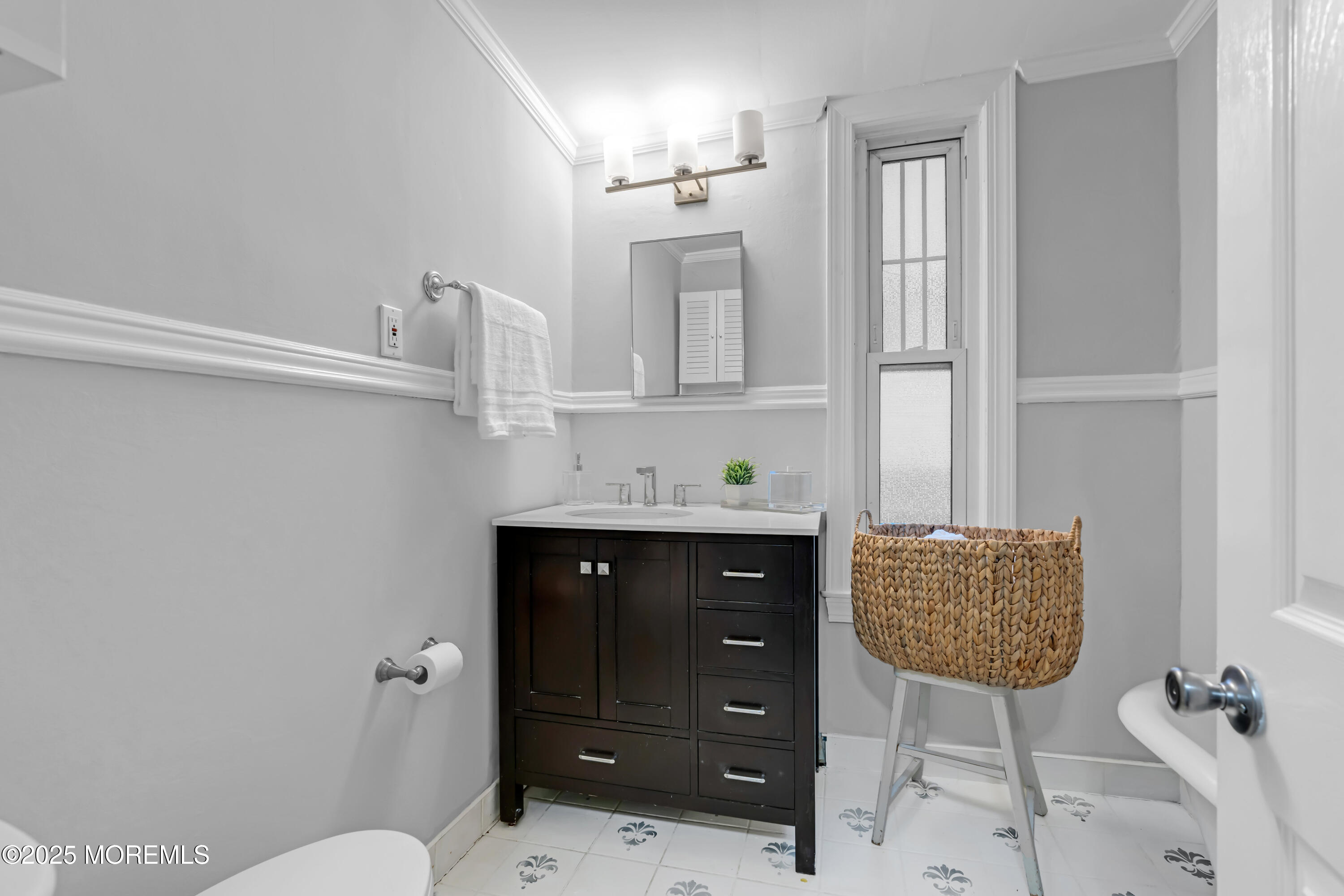 18 Middletown Avenue Atlantic Highlands, NJ 07716 - Photo 31 of 35 a bathroom with a sink vanity mirror and toilet