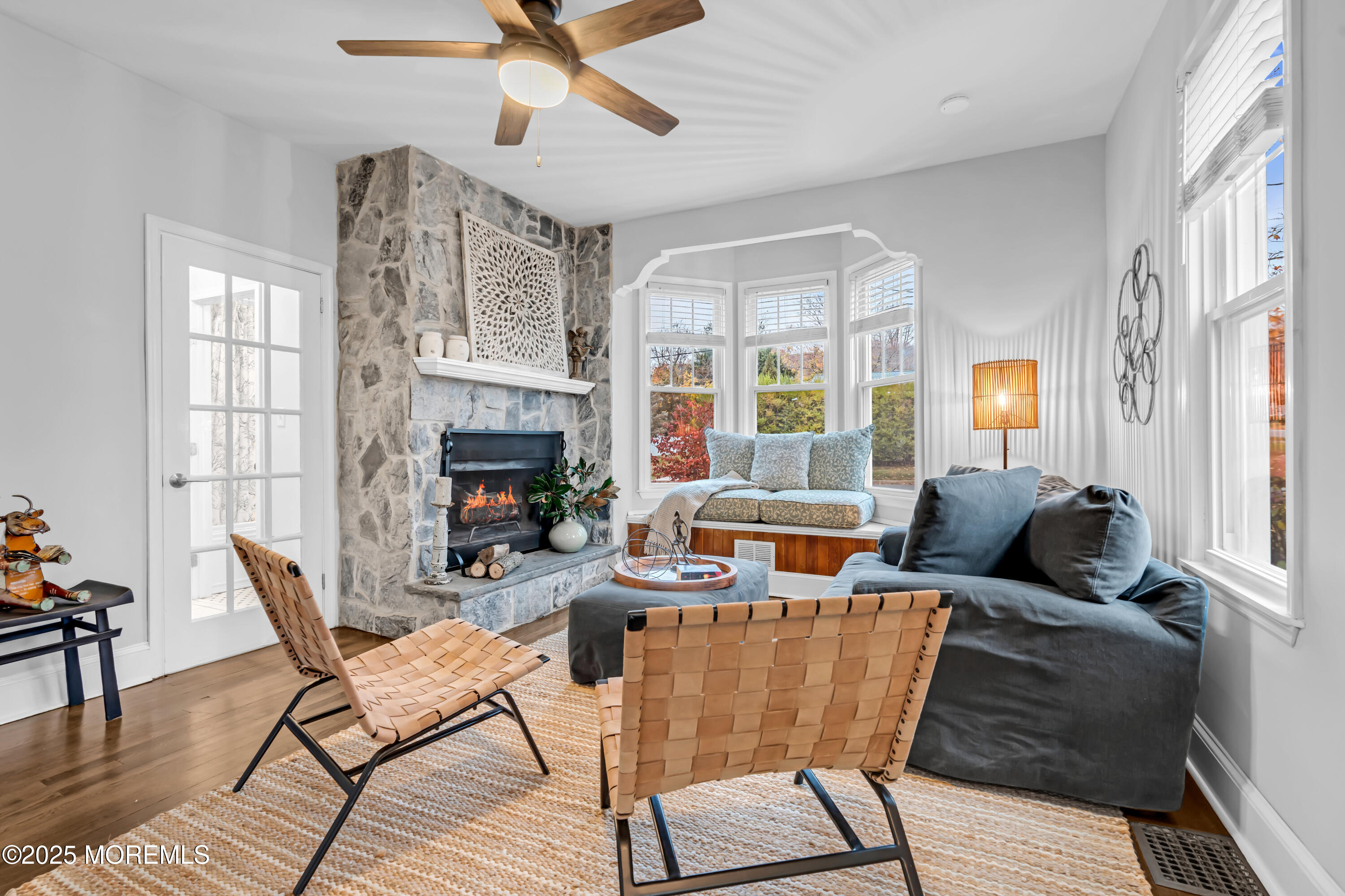 18 Middletown Avenue Atlantic Highlands, NJ 07716 - Photo 8 of 35 a living room with fireplace furniture and a wooden floor