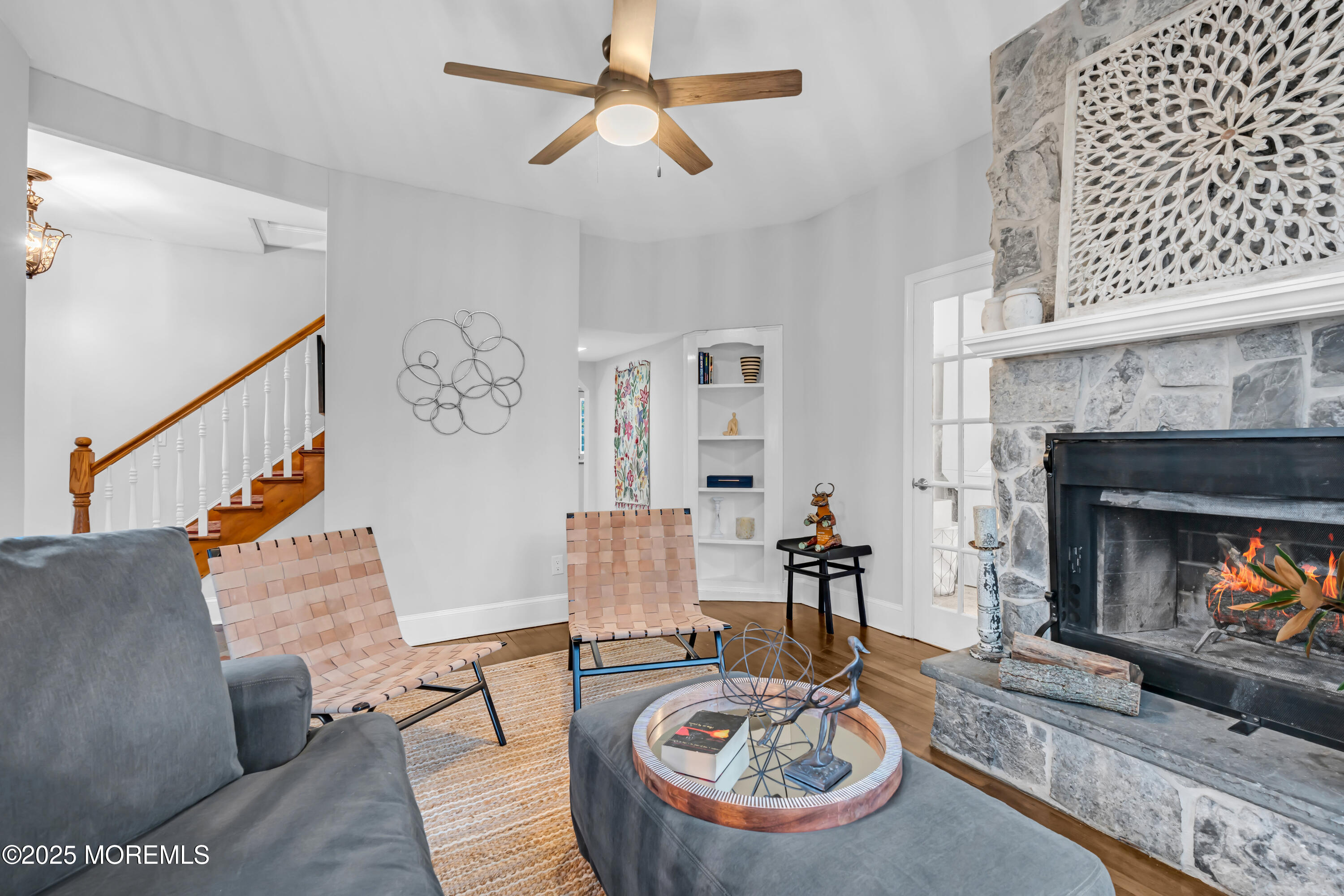 18 Middletown Avenue Atlantic Highlands, NJ 07716 - Photo 10 of 35 a living room with furniture and a fireplace