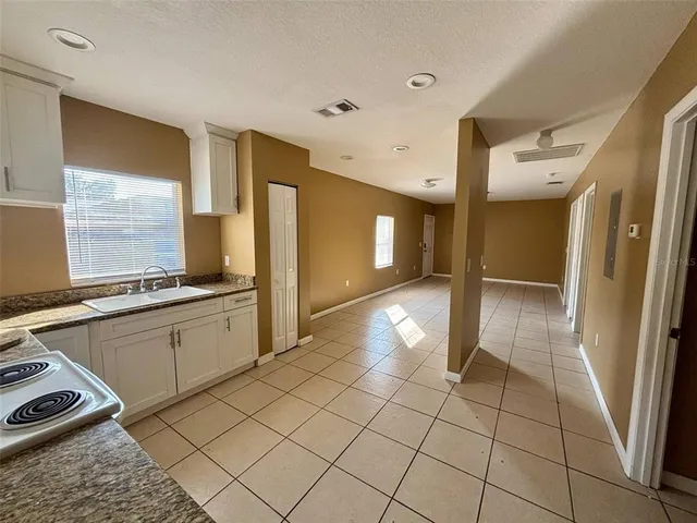 a bathroom with a sink a mirror and a shower