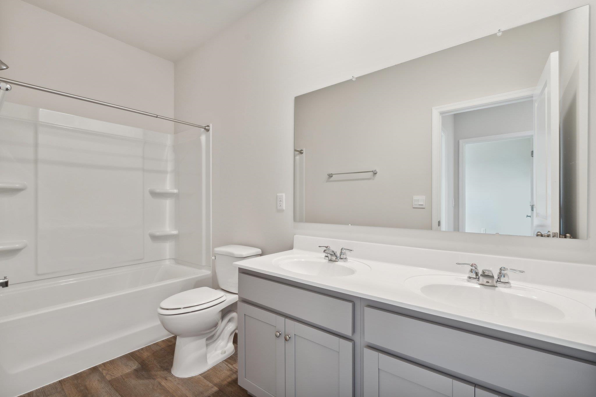 95 Jillian Lane Penn Laird, VA 22846 - Photo 18 of 22 a bathroom with a sink a toilet and shower