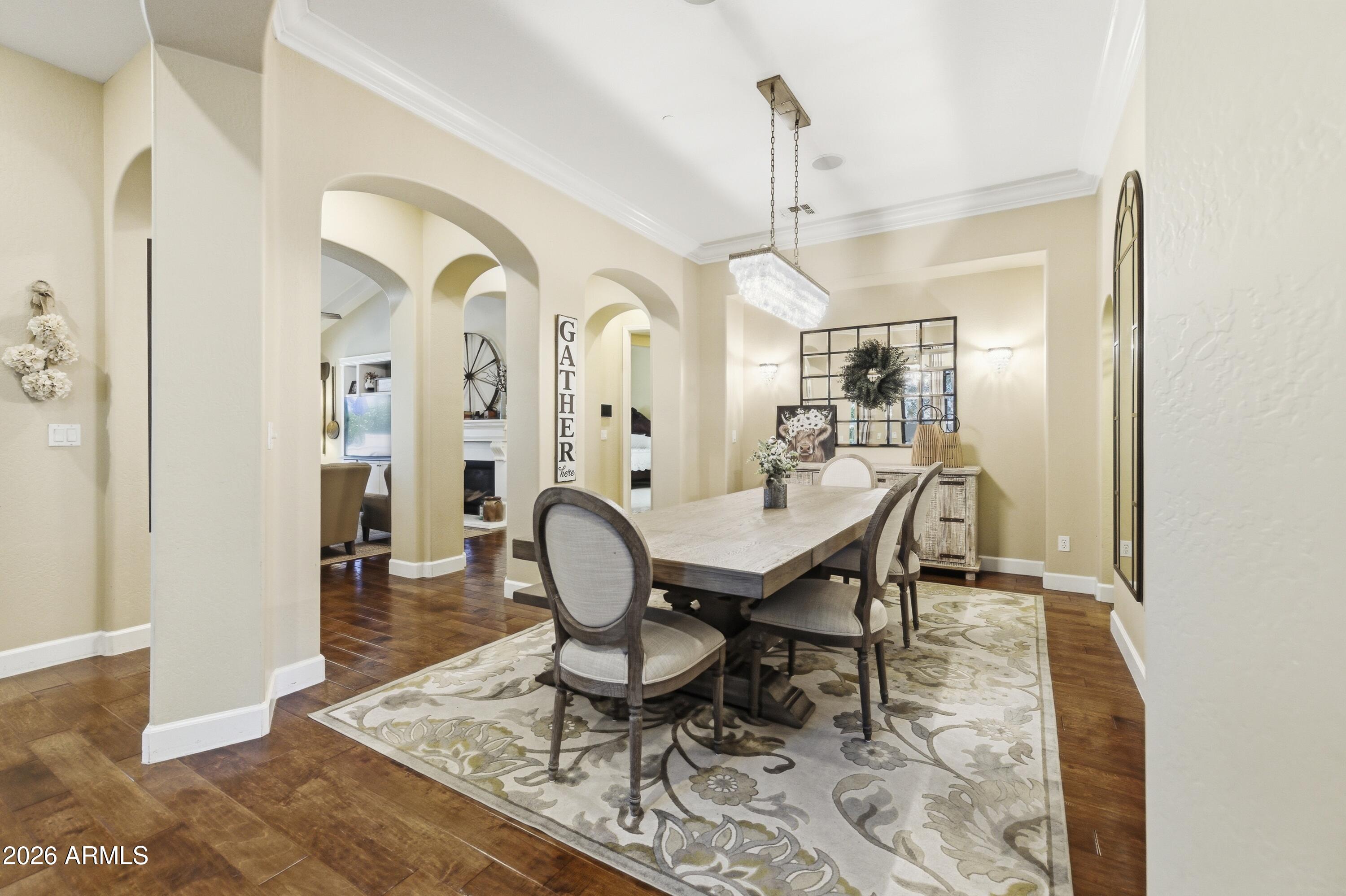 14474 West Coronado Road Goodyear, AZ 85395 - Photo 13 of 74 a view of a dining room with furniture