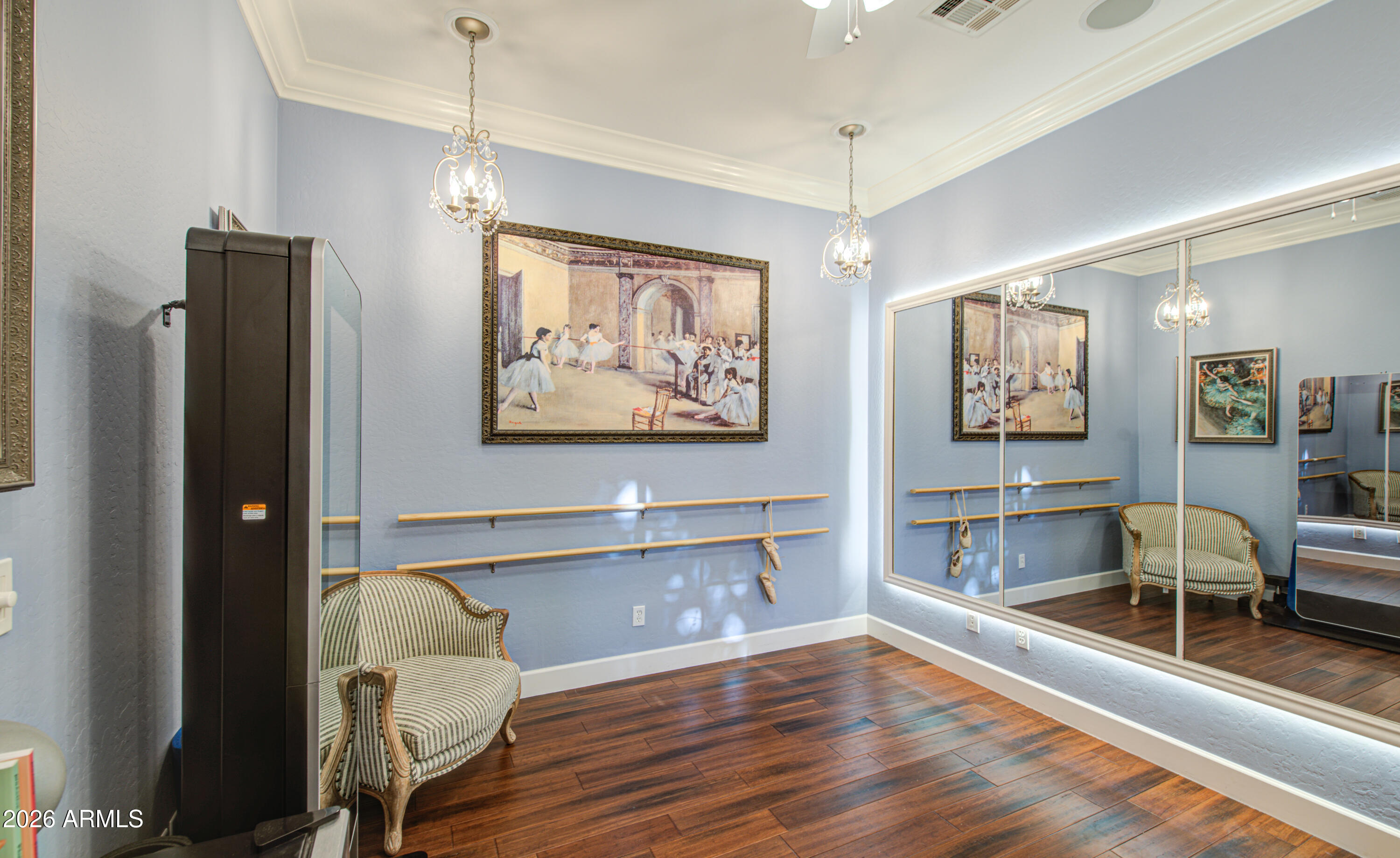 14474 West Coronado Road Goodyear, AZ 85395 - Photo 16 of 74 a view of a room with wooden floor and furniture