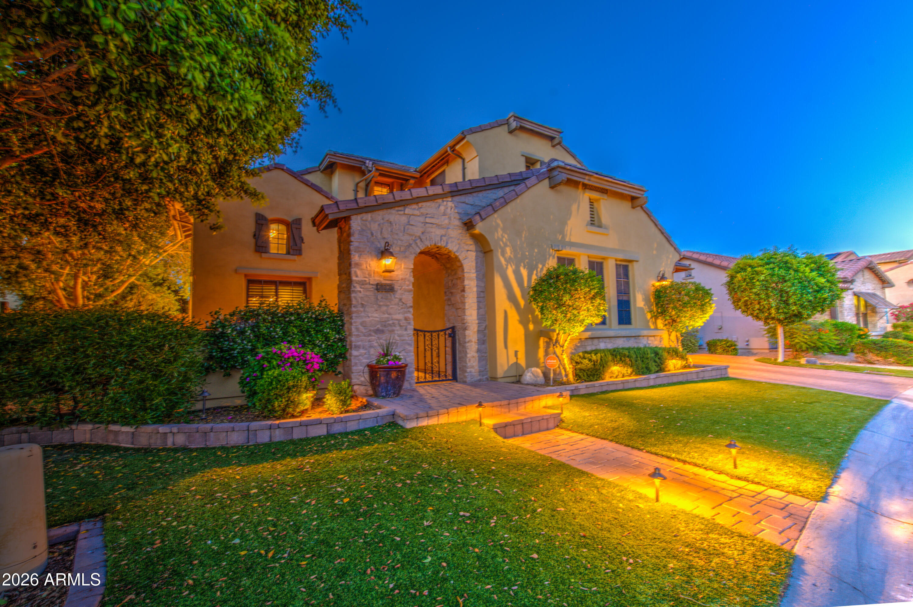 14474 West Coronado Road Goodyear, AZ 85395 - Photo 49 of 74 a front view of a house with a yard
