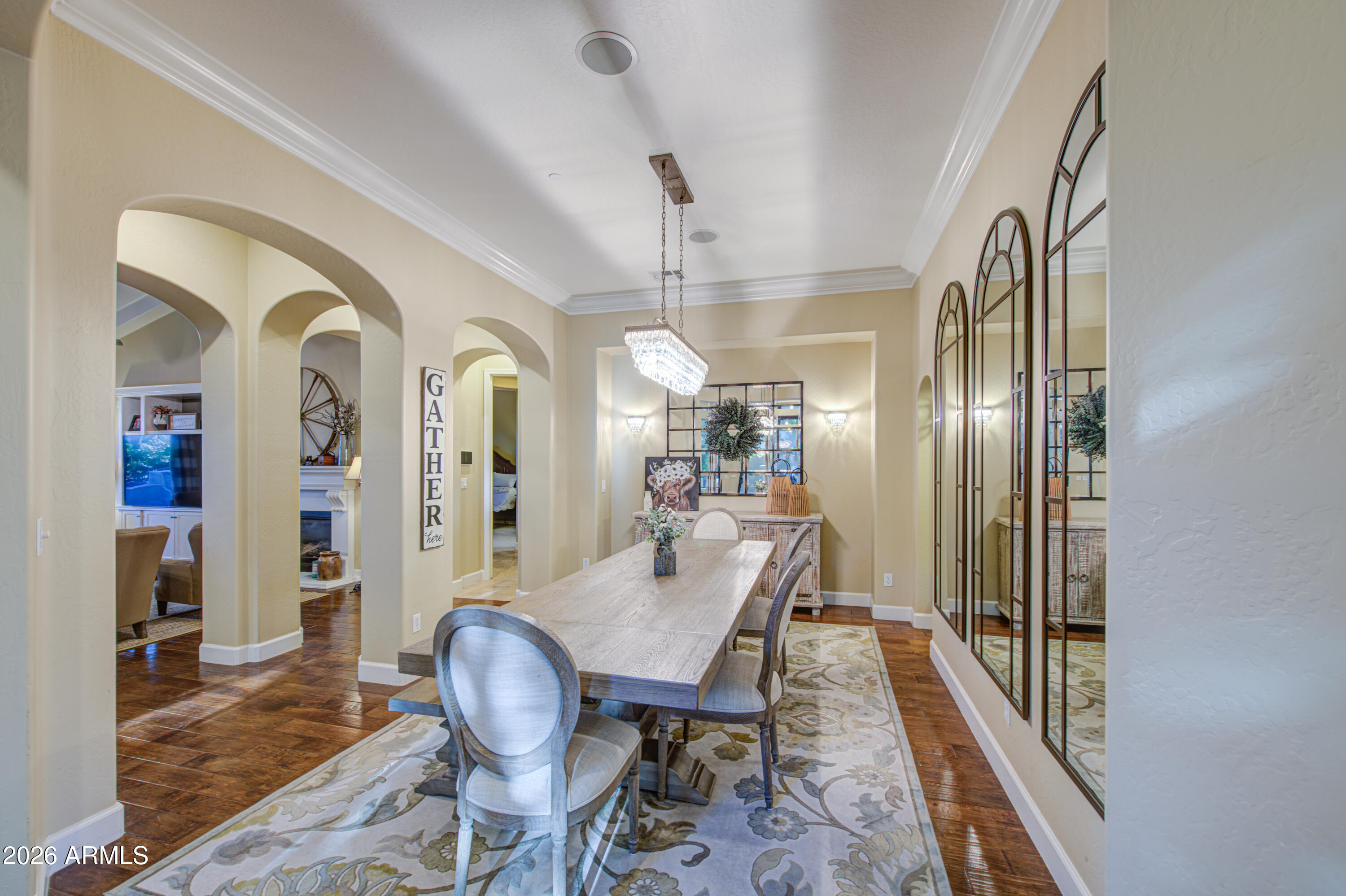 14474 West Coronado Road Goodyear, AZ 85395 - Photo 52 of 74 a view of a livingroom with furniture window and wooden floor