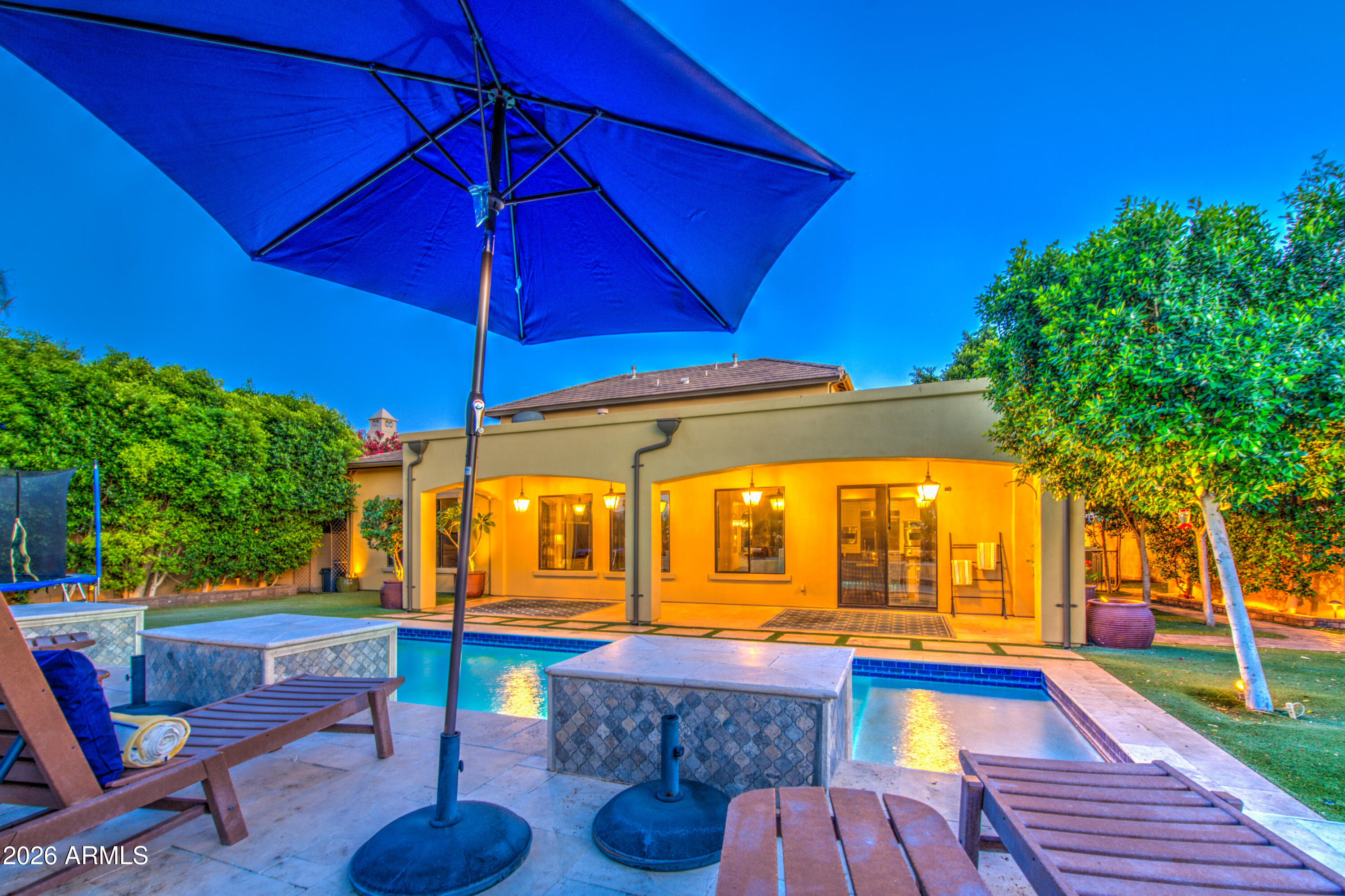 14474 West Coronado Road Goodyear, AZ 85395 - Photo 62 of 74 a view of swimming pool with a patio