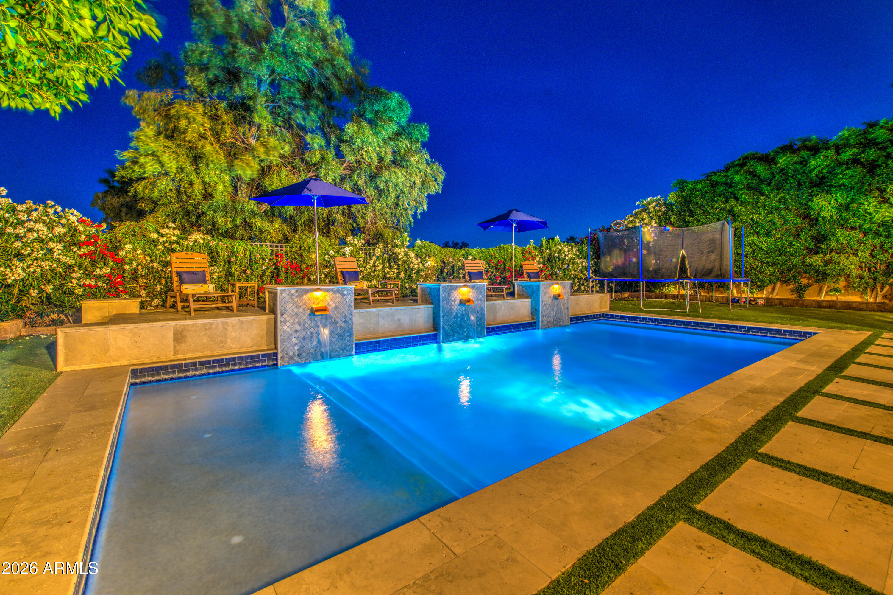14474 West Coronado Road Goodyear, AZ 85395 - Photo 65 of 74 a view of a swimming pool with an outdoor seating