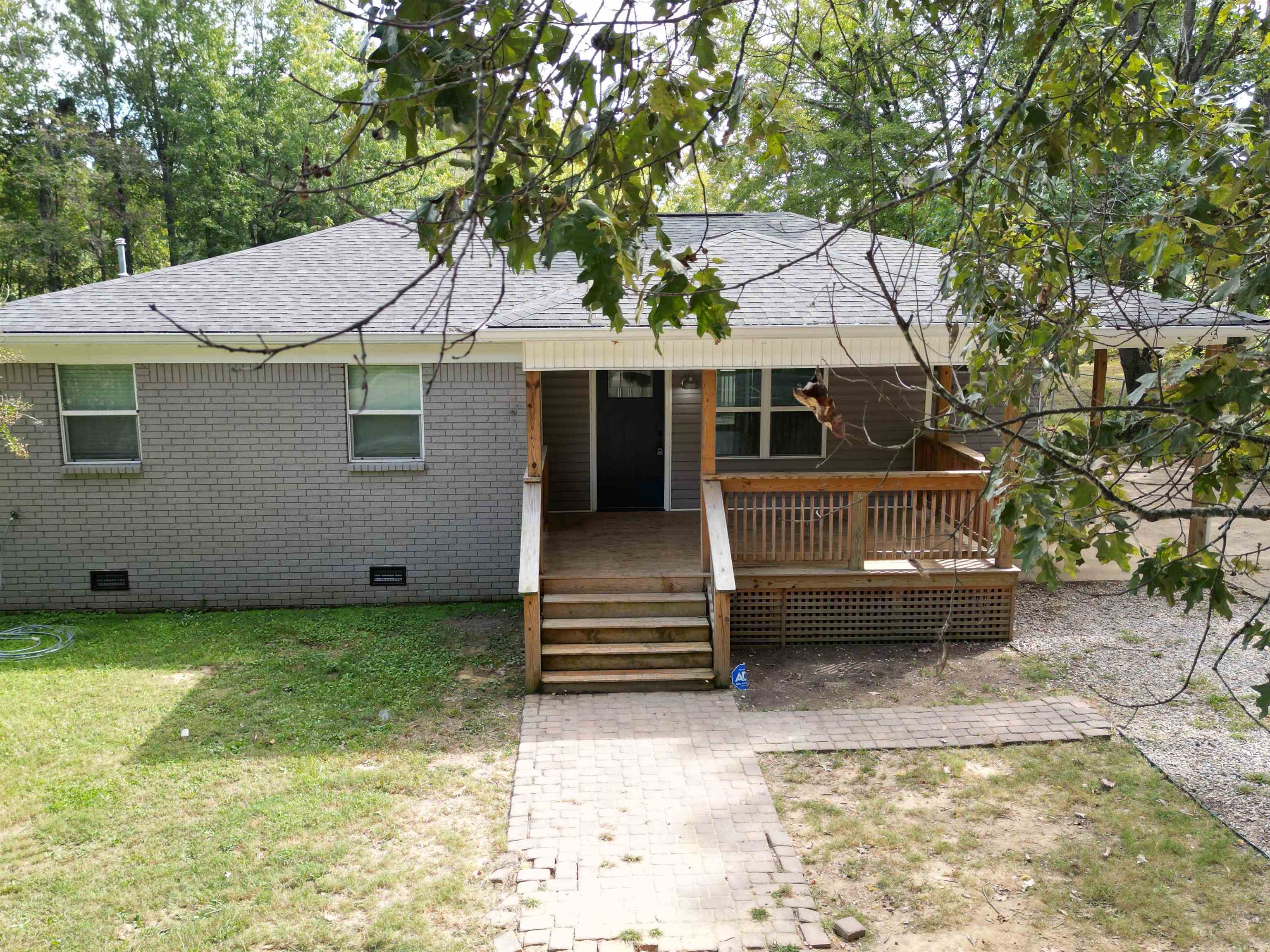 8074 Van Road Arlington, TN 38002 - Photo 13 of 24 a view of a white house with a big yard and large tree