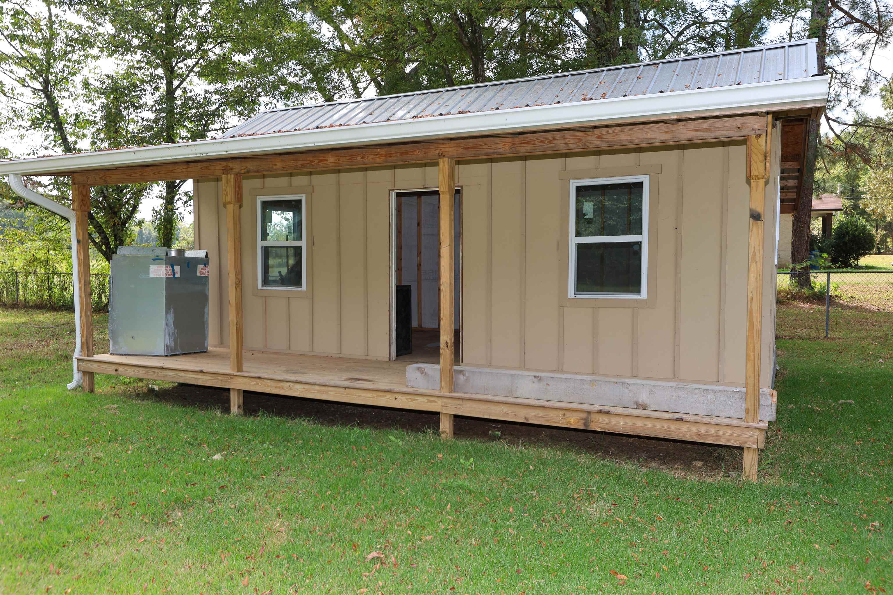 8074 Van Road Arlington, TN 38002 - Photo 20 of 24 a view of a house with a backyard