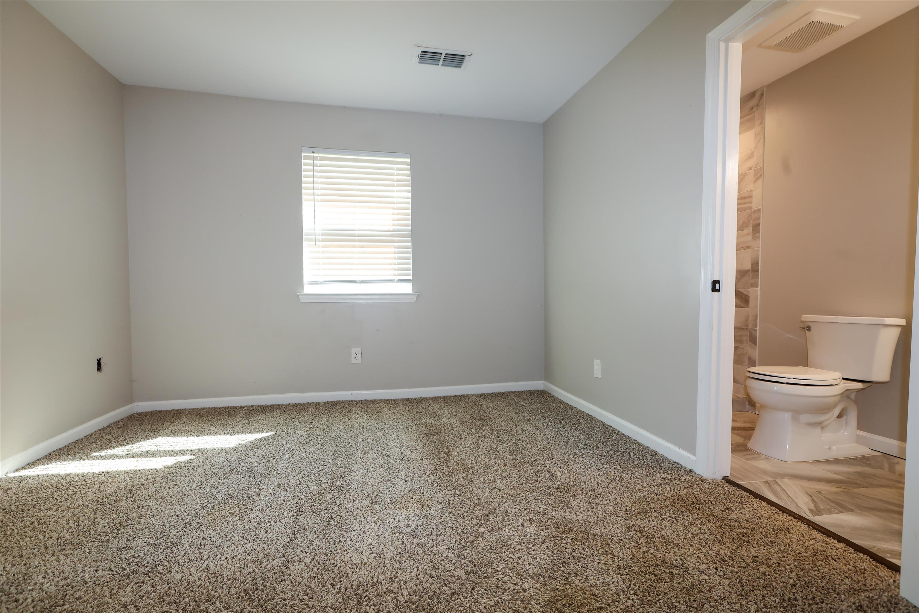 8074 Van Road Arlington, TN 38002 - Photo 2 of 24 a view of a room that has a window in it