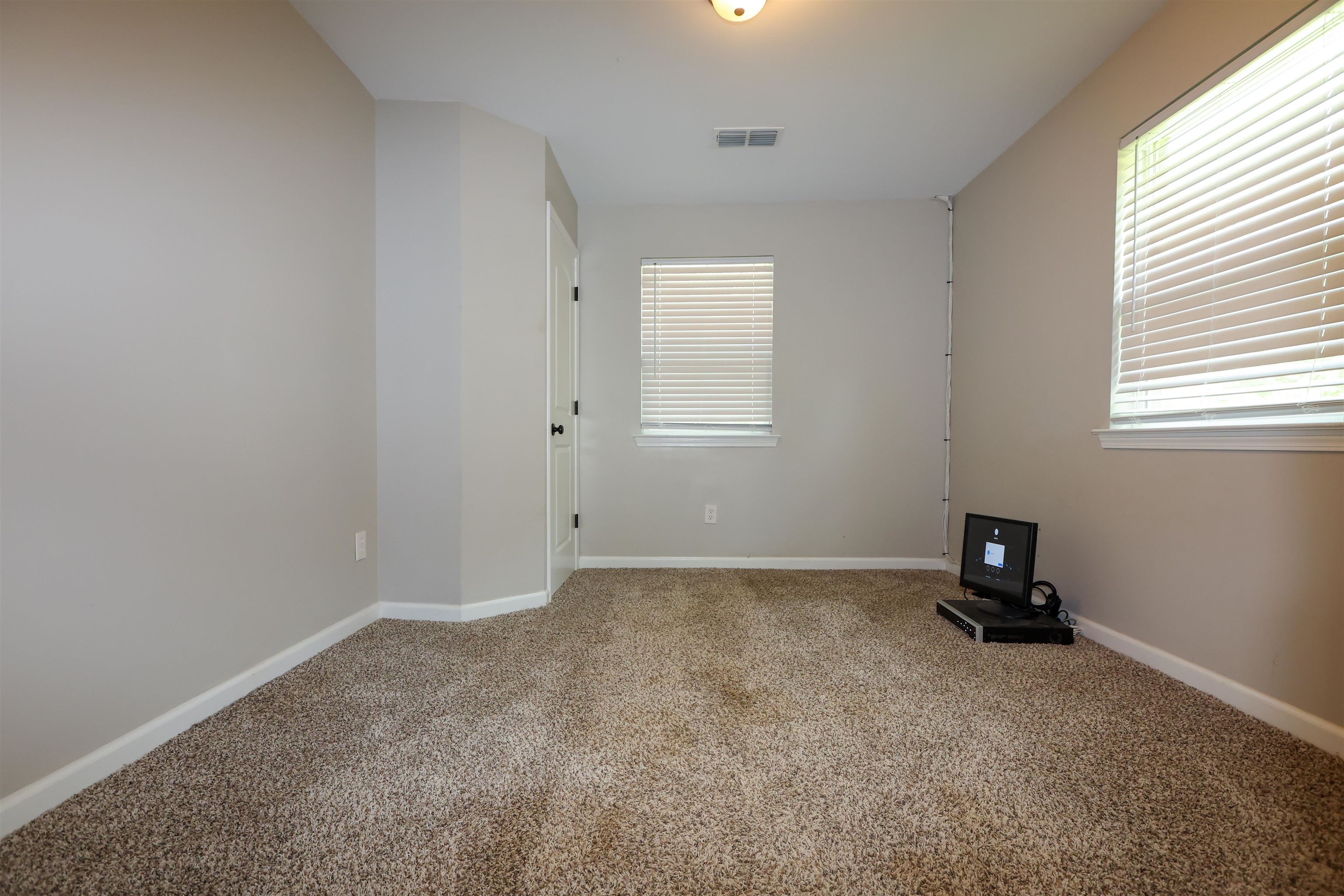 8074 Van Road Arlington, TN 38002 - Photo 3 of 24 an empty room with a window