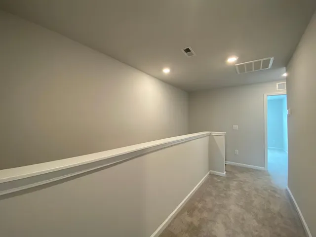 a bathroom with a bathtub and toilet