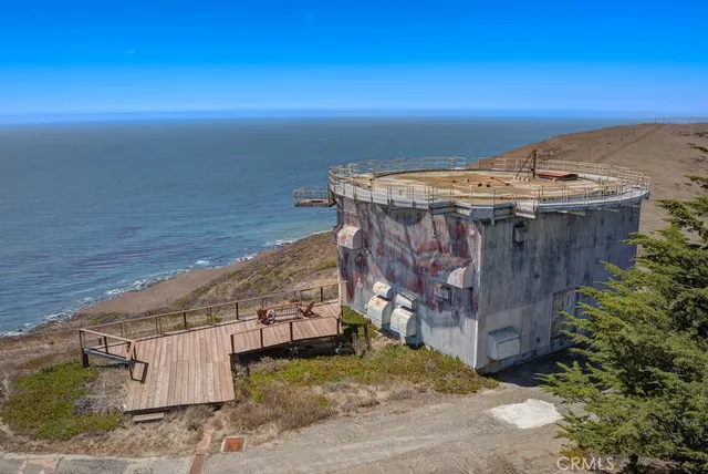 a view of a road with a building in the background