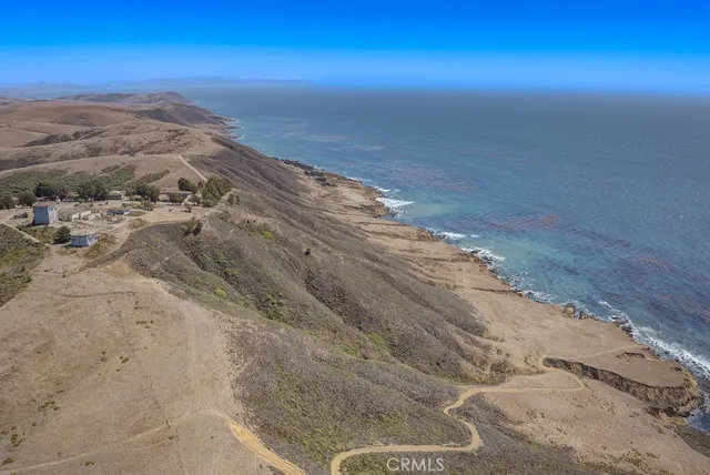 a view of balcony with wooden floor