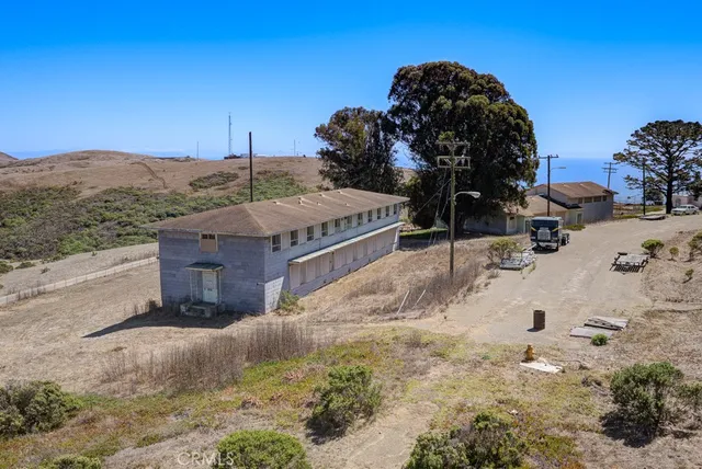 a view of a swimming pool with an outdoor seating