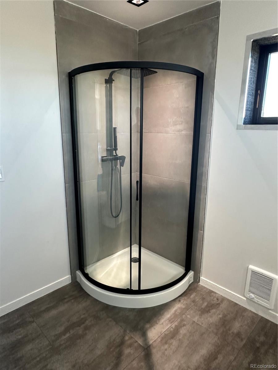 99 Cedar Ridge Road Mosca, CO 81146 - Photo 20 of 36 a view of water heater room