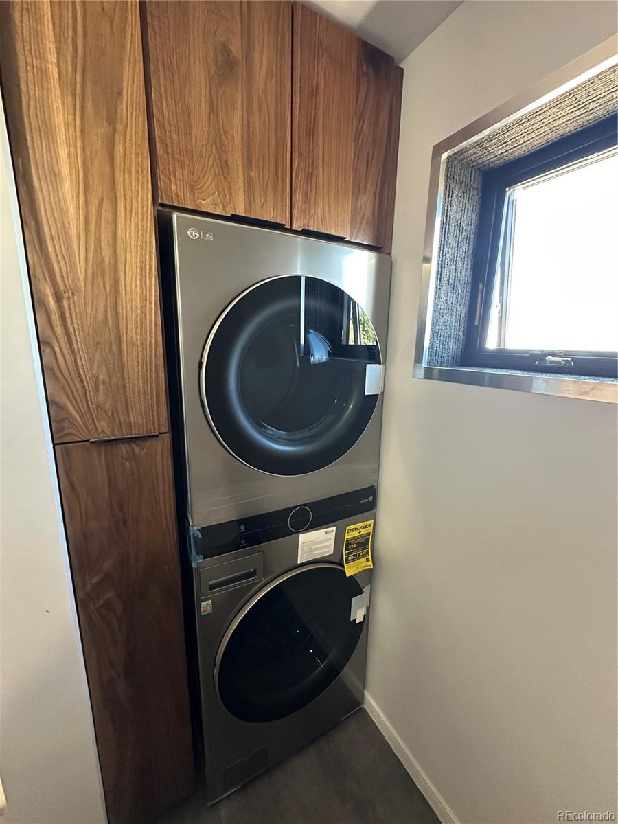99 Cedar Ridge Road Mosca, CO 81146 - Photo 22 of 36 a utility room with dryer and washer