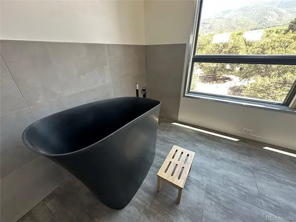 a room with a bed and a window