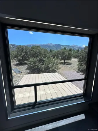 a view of entry way with wooden floor