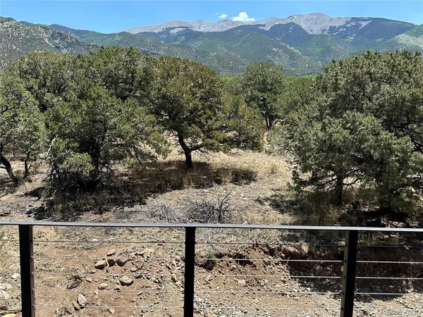 a view of a road with a building in the background