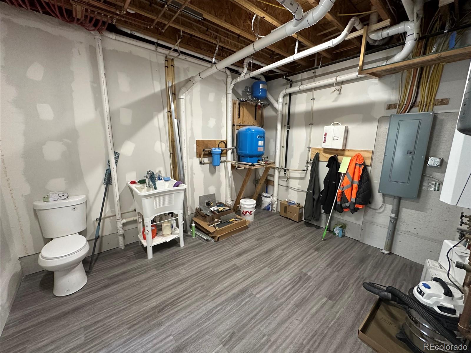 99 Cedar Ridge Road Mosca, CO 81146 - Photo 6 of 36 a view of a room with wooden floor and furniture