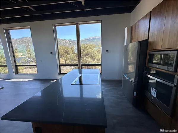 a living room with large window