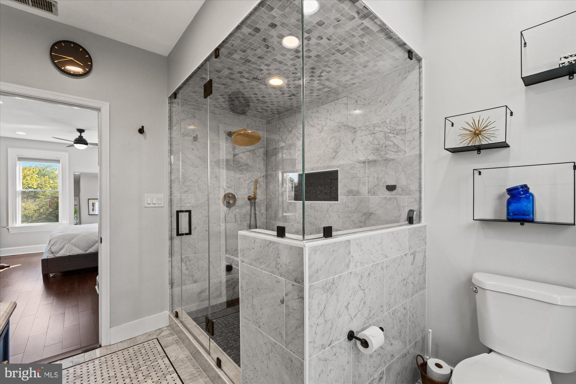 1204 5th Street Northeast Washington, DC 20002 - Photo 24 of 46 a bathroom with a sink a toilet and shower