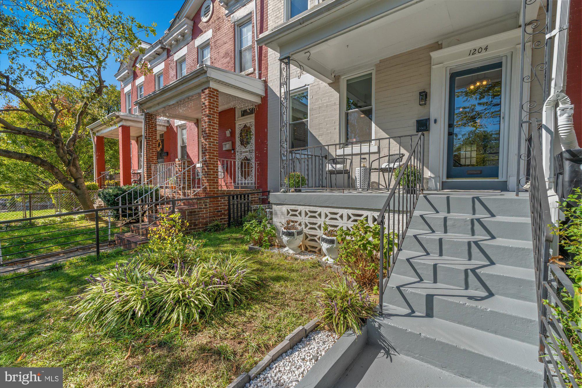 1204 5th Street Northeast Washington, DC 20002 - Photo 3 of 46 a front view of a house with garden