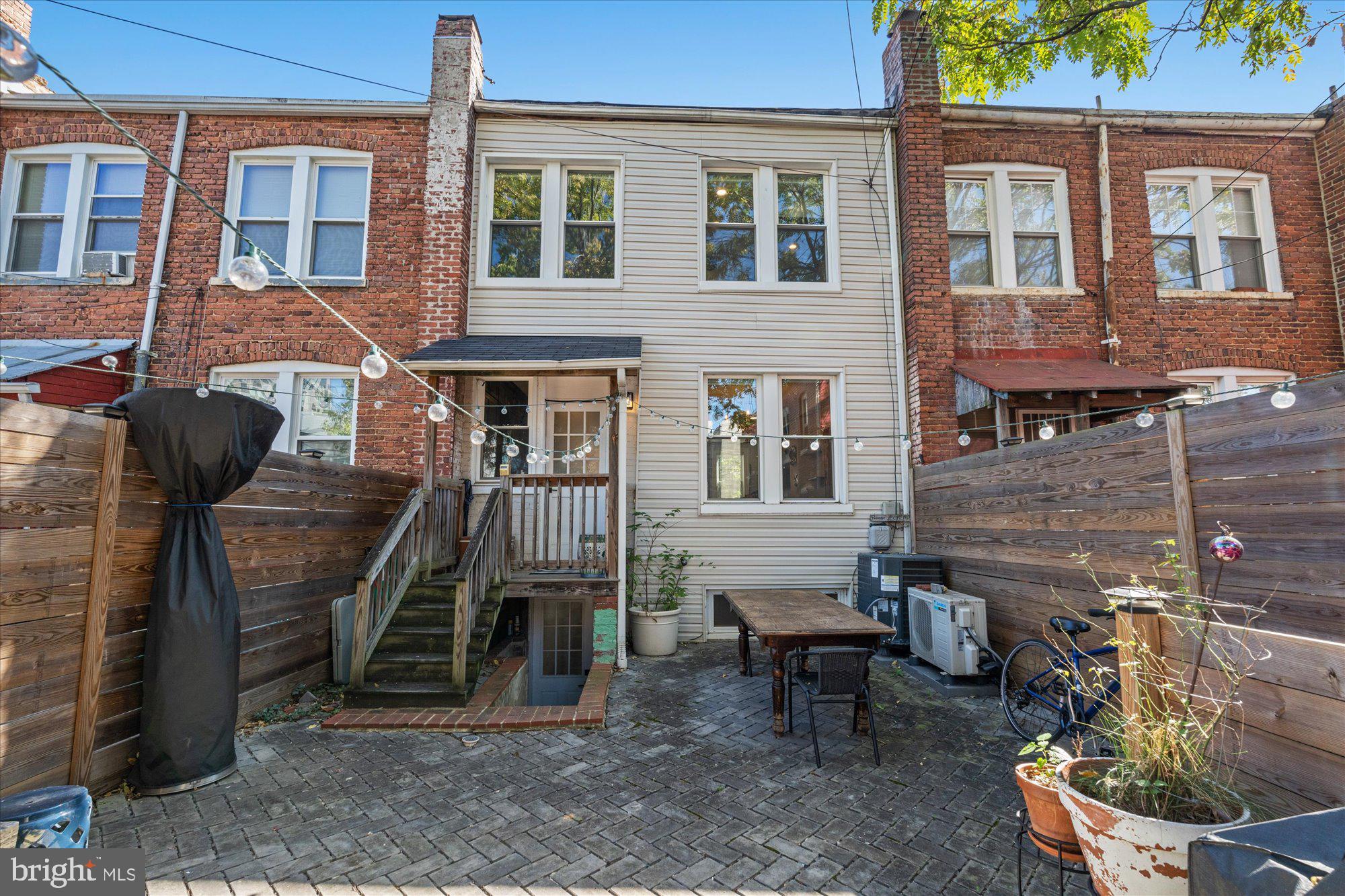 1204 5th Street Northeast Washington, DC 20002 - Photo 42 of 46 a view of a house with backyard and porch
