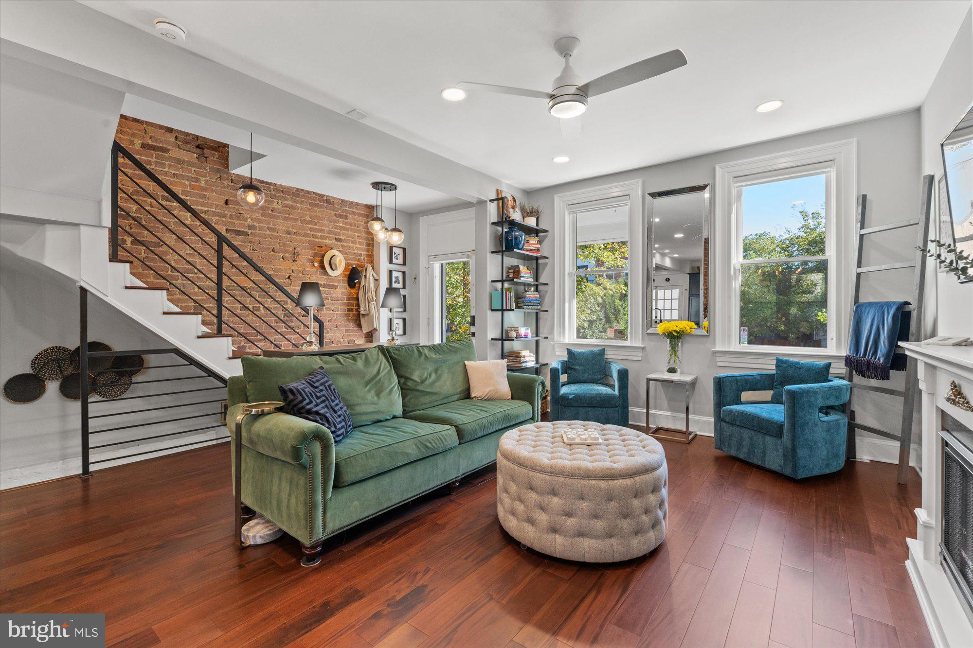 1204 5th Street Northeast Washington, DC 20002 - Photo 6 of 46 a living room with furniture and a wooden floor