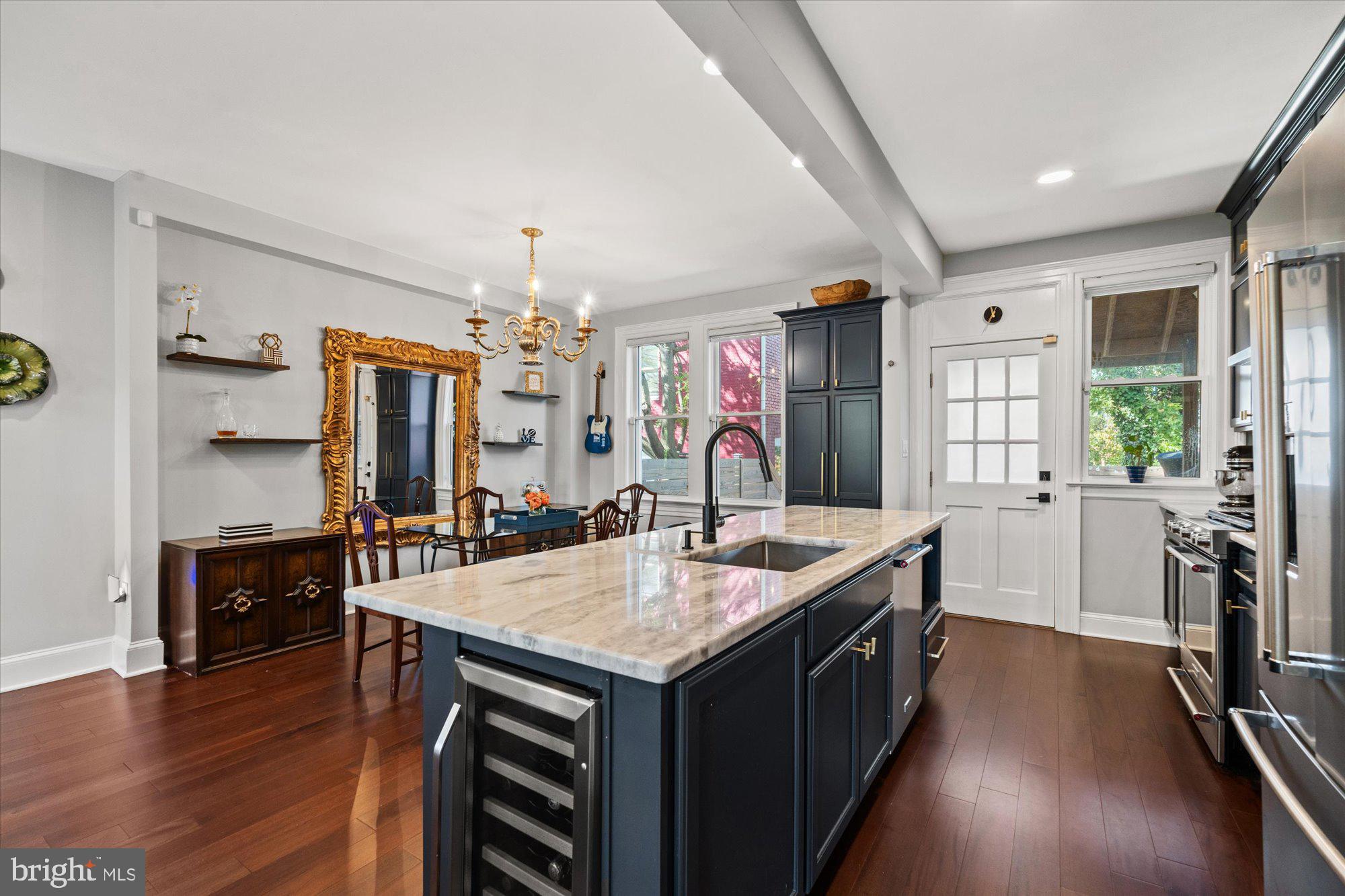 1204 5th Street Northeast Washington, DC 20002 - Photo 10 of 46 a kitchen with a stove and wooden floor