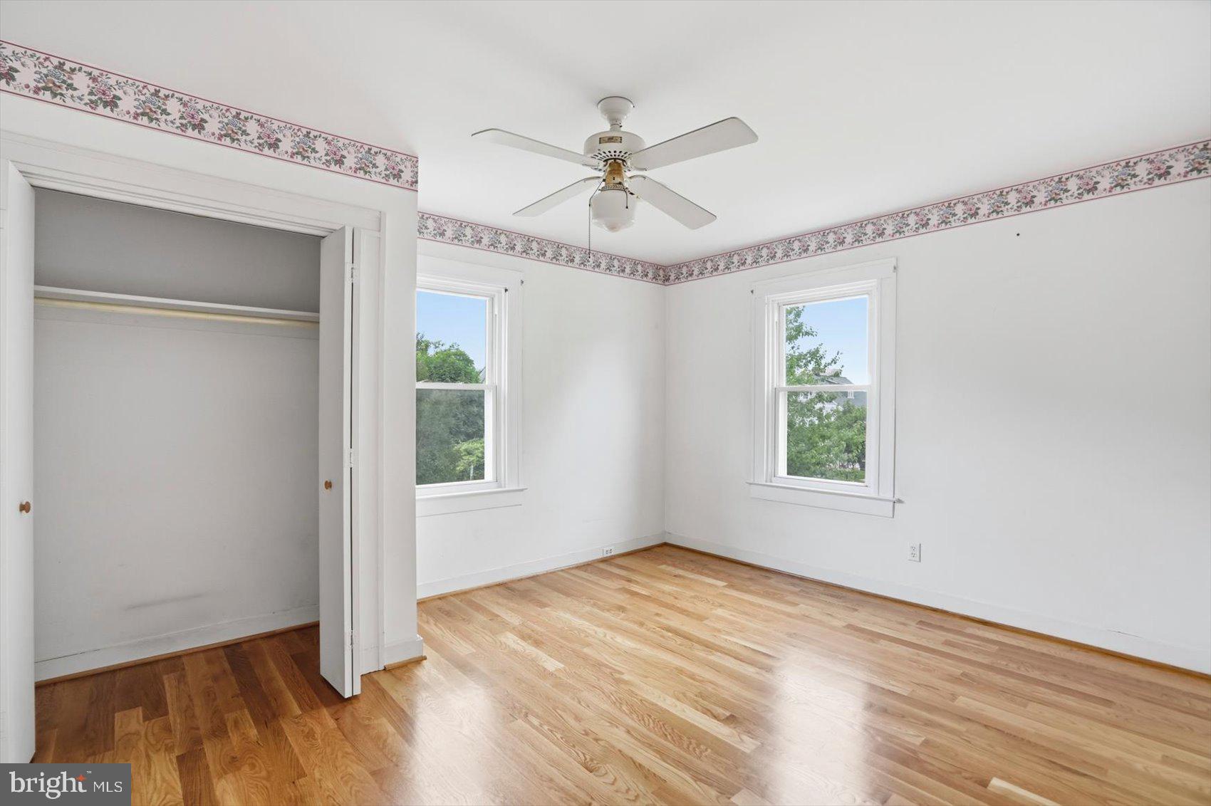 24 Normal Terrace Baltimore, MD 21286 - Photo 33 of 37 a view of empty room with wooden floor and fan