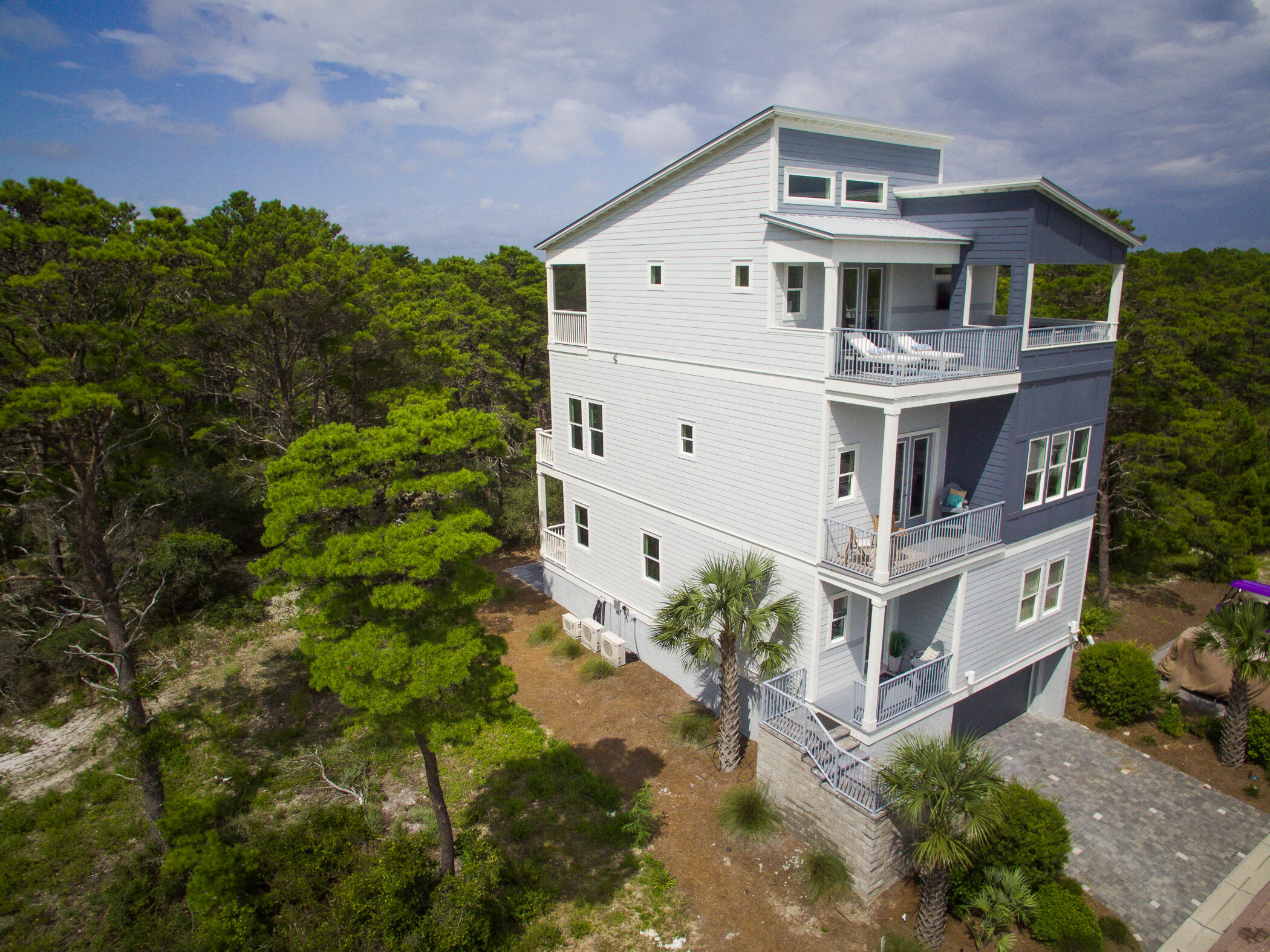 31 Conscience Way Santa Rosa Beach, FL 32459 - Photo 1 of 70 a front view of a house with a yard